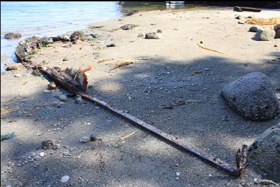 wreckage on beach at low tide