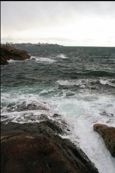 AT THE POINT WITH DOWNTOWN IN DISTANCE