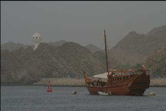 dhow and giant incense burner