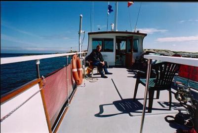 ON ROOF OF DIVE BOAT