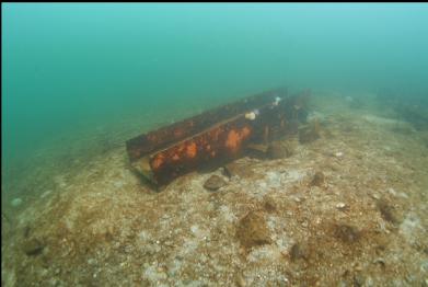 big metal thing near shore