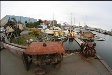 display machinery and marina in background