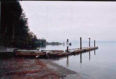 BOAT RAMP AND RUBBLE BREAKWATER IN DISTANCE