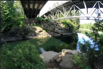 under the highway bridges