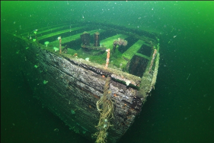 exposed beams at the end of a drydock