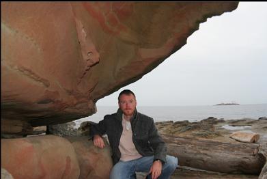 SANDSTONE OVERHANG ON BEACH