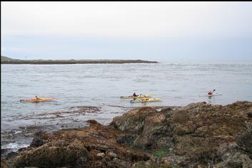 KAYAKERS GOING THROUGH CHANNEL