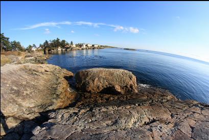 shoreline at saxe Point with Gillingham Islets in the distance