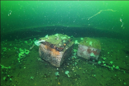 blocks on the deck with another drydock in the background