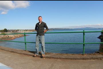 RAILING ABOVE BEACH