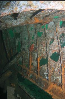 RUSTED HOLES IN BOW