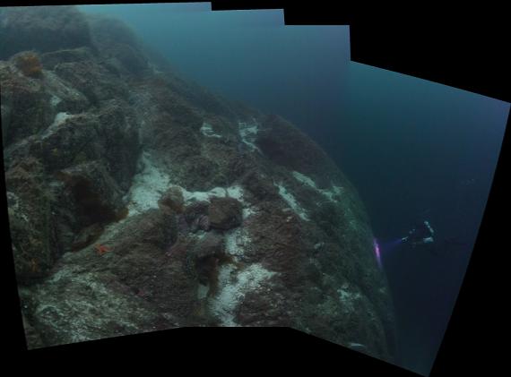 over edge of wall