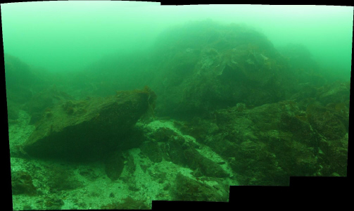 THE TRIANGULAR BOULDER IN THE MIDDLE IS THE SIZE OF A CAR
